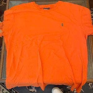 Orange Polo with green logo